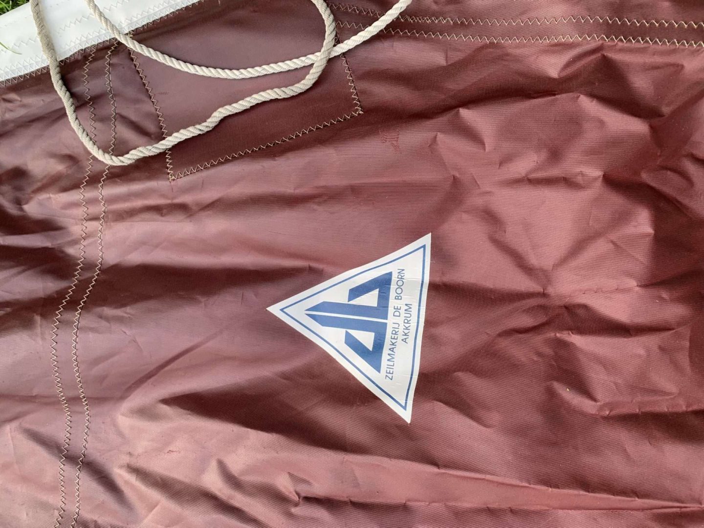 Bruine dacron zeilen van kotter